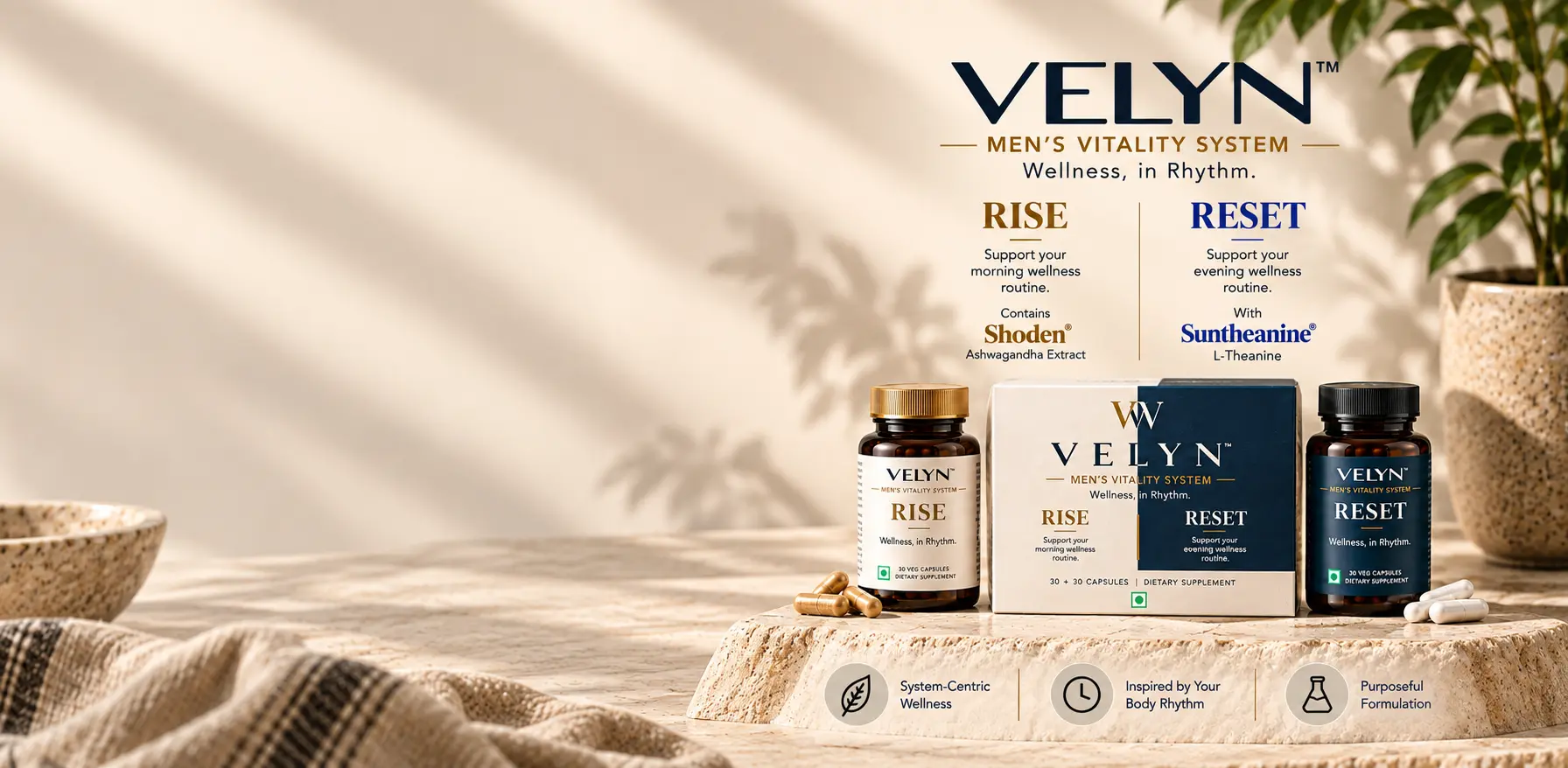 Velyn men's vitality system Rise and Reset supplement bottles and packaging displayed on a beige stone platform, featuring Shoden Ashwagandha extract and Suntheanine L-Theanine.